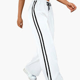 Pantalon large sport femme style streetwear à bandes – coupe décontractée idéale pour le quotidien