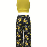 Ensemble féminin jupe longue fendue à motifs tropicaux et crop top élégant pour été