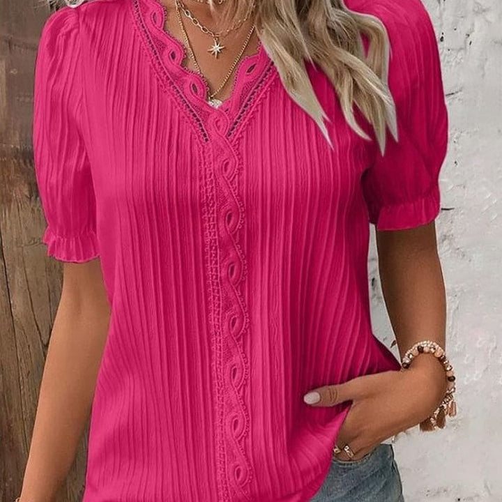 Elegancka bluzka z koronką z dekoltem w serek