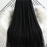 Jupe midi élégante à pois pour femme, style évasé chic, idéale pour le printemps et l'été