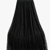 Jupe midi élégante à pois pour femme, style évasé chic, idéale pour le printemps et l'été