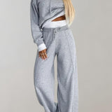 Nina | Dwuczęściowy dres hoodie z szerokimi spodniami damski