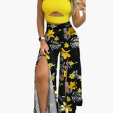 Ensemble féminin jupe longue fendue à motifs tropicaux et crop top élégant pour été