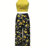 Ensemble féminin jupe longue fendue à motifs tropicaux et crop top élégant pour été