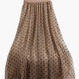 Jupe midi élégante à pois pour femme, style évasé chic, idéale pour le printemps et l'été