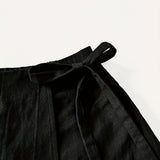 Jupe portefeuille courte style urbain pour femme, look décontracté chic, idéale pour l'été