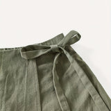 Jupe portefeuille courte style urbain pour femme, look décontracté chic, idéale pour l'été