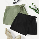 Jupe portefeuille courte style urbain pour femme, look décontracté chic, idéale pour l'été